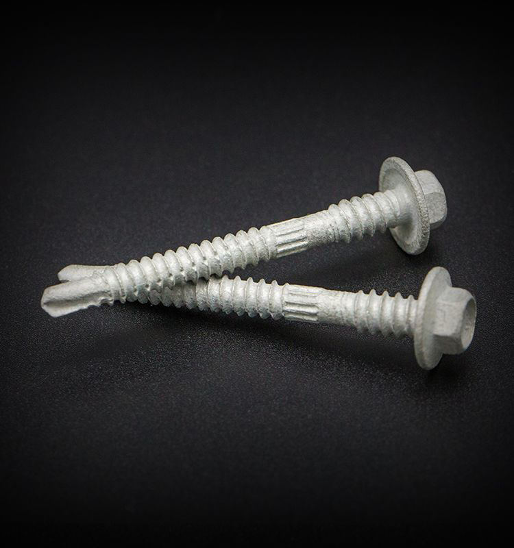 Tornillos de perforación con brida hexagonal (estriados)